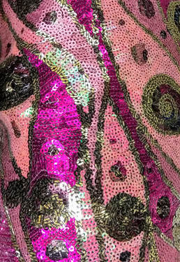 pink and gold elaborately sequined fabric